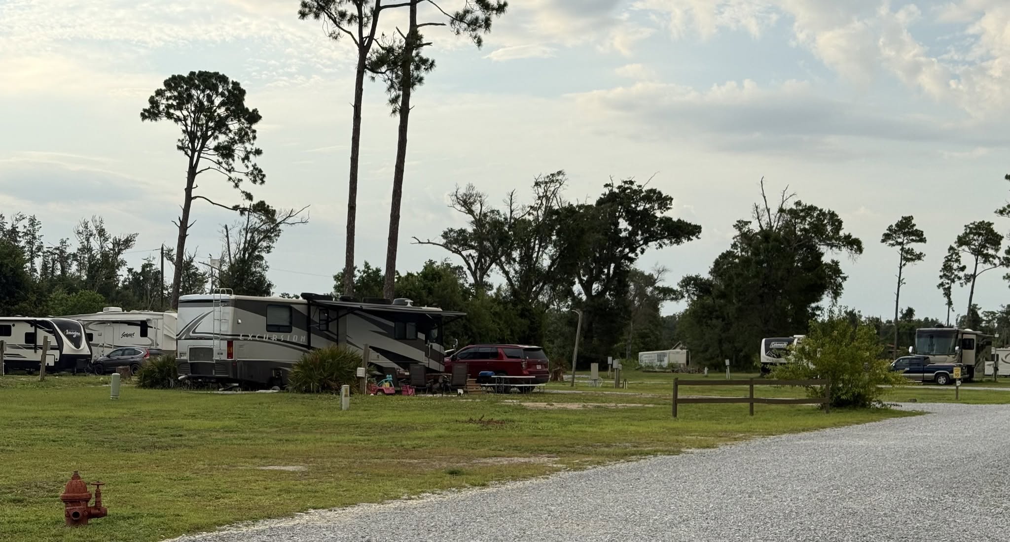 RVs parked on the resort grounds in the evening