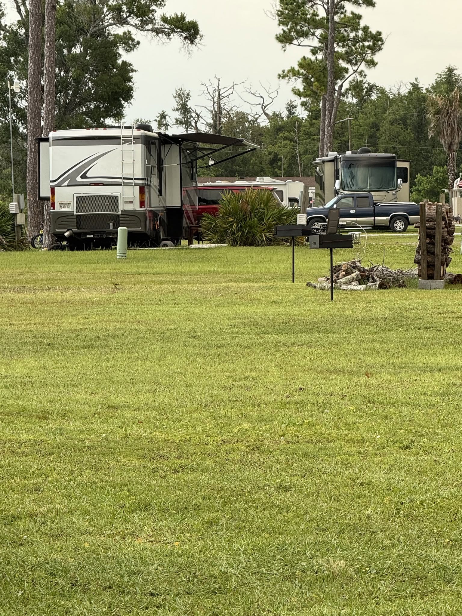 RV site with firewood stacked and ready